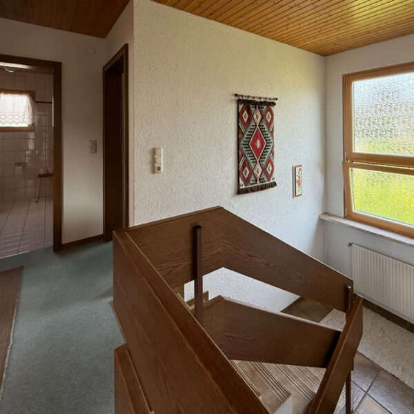 Einfamilienhaus mit großem Garten in Meiningen - Stiegenhaus - Amann Immobilien