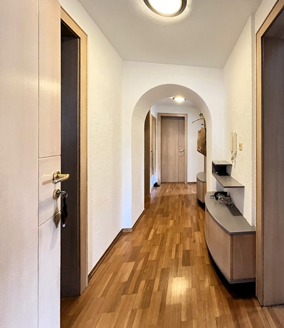 Wohn- und Geschäftshaus in Feldkirch-Altenstadt - Wohnung OG Gang - Amann Immobilien