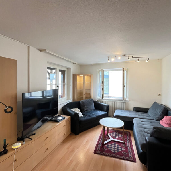 Wohn- und Geschäftshaus in Feldkirch-Altenstadt - Wohnung OG Wohnzimmer - Amann Immobilien