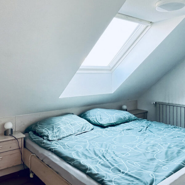 Wohn- und Geschäftshaus in Feldkirch-Altenstadt - Wohnung DG Schlafzimmer - Amann Immobilien