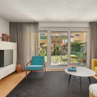 Reihenhaus in Feldkirch in ruhiger Lage am Waldrand - Wohnzimmer - Amann Immobilien