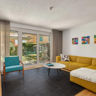Reihenhaus in Feldkirch in ruhiger Lage am Waldrand - Wohnzimmer - Amann Immobilien