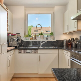 Reihenhaus in Feldkirch in ruhiger Lage am Waldrand - Küche - Amann Immobilien